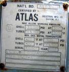 Used Atlas Shell and Tube Heat Exchanger, approximatelly 152 square feet, vertical, type BEM14-81. Carbon steel shell rated 100 psi at 300 deg F, (120) 3/4