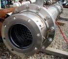 Used AstroCosmo Shell and Tube Heat Exchanger, 150 square feet , horizontal.Tantalum tubes, tube sheets and bonnets with (80) 3/4
