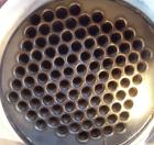 Used Astro Metallurgical Shell And Tube Heat Exchanger, Approximately 150 Square Feet, Horizontal. Carbon steel shell rated 75 psi at 250 deg F, (96) 3/4