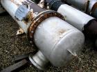 Used Atlas Shell and Tube Heat Exchanger, approximately 411 square feet, vertical. Type BEM22-72. Carbon steel shell rated 100 psi at 300 deg F, (350) 3/4'' diameter x 6' long Hastelloy C-22 tubes ra...