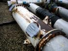 Used Atlas Shell and Tube Heat Exchanger, approximately 411 square feet, vertical. Type BEM22-72. Carbon steel shell rated 100 psi at 300 deg F, (350) 3/4'' diameter x 6' long Hastelloy C-22 tubes ra...