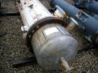 Used Atlas Shell and Tube Heat Exchanger, approximately 411 square feet, vertical. Type BEM22-72. Carbon steel shell rated 100 psi at 300 deg F, (350) 3/4'' diameter x 6' long Hastelloy C-22 tubes ra...