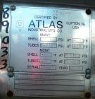 USED: Atlas four pass shell and tube heat exchanger, 561 square feet, horizontal. Hastelloy C276 shell rated FV and 150 psi at 400 deg F, (144) 3/4