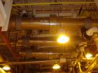 Used Atlas Single Pass Shell And Tube Heat Exchanger, 102 square feet, horizontal. Type BEM10-120. Carbon steel shell rated 100 psi at 300 deg.f., carbon steel baffles, and expansion ring. (52) 3/4