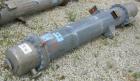 Used: Atlas shell and tube heat exchanger, approx 154 square feet, vertical. Carbon steel shell rated 100 psi at 300 deg.f.,(120) 3/4