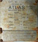 Used: Atlas shell and tube heat exchanger, approx 154 square feet, vertical. Carbon steel shell rated 100 psi at 300 deg.f.,(120) 3/4