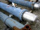 Used Atlas Shell and Tube Heat Exchanger, 167 square feet, vertical. Type BEM14-84.  Carbon steel shell rated 100 psi at 300 deg F, (122) 3/4