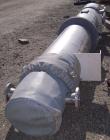 Used Atlas Single Pass Shell and Tube Heat Exchanger, 399 square feet, horizontal, type BEM18-120. Carbon steel shell rated 100 psi at 300 deg F, carbon steel baffles and expansion ring. (208) 3/4