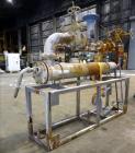 Used- Fluid Handling, Xylem U Tube Heat Exchanger, Approximate 169 Square Feet, Horizontal. Carbon steel shell rated 150 psi...