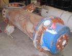 Used Cosmos Shell And Tube Heat Exchanger, 215 Square Feet, Type BEM 20-1-60, Vertical. Carbon steel shell rated 150 psi/FV at 400 deg F, tantalum tubes rated 150 psi/FV at 400 deg F.