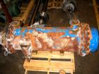 Used Cosmos Shell And Tube Heat Exchanger, 215 Square Feet, Type BEM 20-1-60, Vertical. Carbon steel shell rated 150 psi/FV at 400 deg F, tantalum tubes rated 150 psi/FV at 400 deg F.