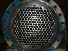 Used Cosmos Shell And Tube Heat Exchanger, 215 Square Feet, Type BEM 20-1-60, Vertical. Carbon steel shell rated 150 psi/FV at 400 deg F, tantalum tubes rated 150 psi/FV at 400 deg F.