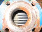Used Cosmos Shell And Tube Heat Exchanger, 215 Square Feet, Type BEM 20-1-60, Vertical. Carbon steel shell rated 150 psi/FV at 400 deg F, tantalum tubes rated 150 psi/FV at 400 deg F.