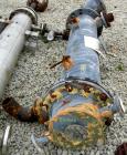 Used Cosmos Single Pass Shell And Tube Heat Exchanger, 123 square feet, vertical. Carbon steel shell rated 150 psi/FV at 400 deg F, (106) 3/4