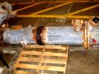 USED: Cosmos shell and tube heat exchanger, 123 square feet, horizontal. Carbon steel shell rated 150 psi/FV at 400 deg F, tantalum tubes rated 150 psi/FV at 400 deg F. Built 1994.