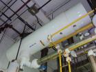 Used Doyle & Roth Shell and Tube Heat Exchanger, 495 square feet, horizontal. 304 stainless steel shell rated 150 psi at 350 deg F and –20 deg F at 150 psi. (421) 3/4