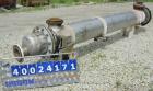 Used Futura Titanium Corporation Single Pass Shell and Tube Heat Exchanger, 319 Square Feet, Horizontal. Type BEM 14-2-144. 316L stainless steel shell rated 60 psi/FV at 350 deg F. (140) 3/4