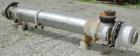 Used Futura Titanium Corporation Single Pass Shell and Tube Heat Exchanger, 319 Square Feet, Horizontal. Type BEM 14-2-144. 316L stainless steel shell rated 60 psi/FV at 350 deg F. (140) 3/4