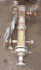 USED: Ketema single pass shell and tube heat exchanger, 23 sq ft, size 6-B-48, vertical. Stainless steel shell rated 150 psi at 350deg F, (30) 3/4