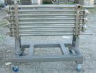 Used Tubular Heat Exchanger, approximately 12 square feet, copper nickel C710/80-20 construction. 1 1/2