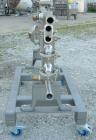 Used Tubular Heat Exchanger, approximately 12 square feet, copper nickel C710/80-20 construction. 1 1/2