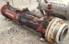 Used Titanium Industries Shell and Tube Heat Exchanger, 151 square feet, horizontal. Tema Type BEM, Tema Size 14-72. Carbon steel shell rated 75 psi at 350 deg F, (129 ) 3/4'' diameter x 6' long Zirc...