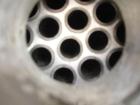 Used Yula Corporation Single Pass Shell and Tube Heat Exchanger, 19 square feet, horizontal, model WC-1A-54AS. Carbon steel shell rated fv/105 psi at 400 deg F and –20 deg F at FV/150 psi. (24) 5/8