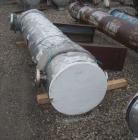 Used Yula Corporation Shell and Tube Heat Exchanger, 299 square feet, horizontal, model WC-1H-96BS. Carbon steel shell rated 150 psi at 350 deg F, (191) 3/4