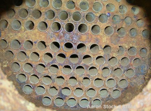 USED: American Standard single pass shell and tube heat exchanger, horizontal, approximately 258 square feet. Carbon steel shell rated 75 psi at 300 deg F, (110) 3/4" diameter x 12' long brass tubes ...