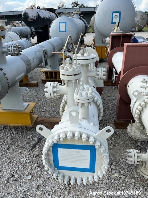 Used Fabsco Shell and Tube Heat Exchanger, 299 Square Foot. Carbon steel tubes rated 405 psi at 32 to 330 degrees F. 13' Tube length. Carbon steel head. Carbon steel shell rated 405 psi at 5 to 300 d...