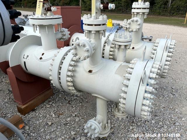 Used Fabsco Shell and Tube Heat Exchanger, 299 Square Foot. Carbon steel tubes rated 405 psi at 32 to 330 degrees F. 13' Tube length. Carbon steel head. Carbon steel shell rated 405 psi at 5 to 300 d...