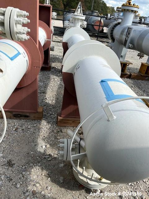 Used Fabsco Shell and Tube Heat Exchanger, 299 Square Foot. Carbon steel tubes rated 405 psi at 32 to 330 degrees F. 13' Tube length. Carbon steel head. Carbon steel shell rated 405 psi at 5 to 300 d...