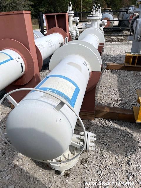 Used Fabsco Shell and Tube Heat Exchanger, 299 Square Foot. Carbon steel tubes rated 405 psi at 32 to 330 degrees F. 13' Tube length. Carbon steel head. Carbon steel shell rated 405 psi at 5 to 300 d...