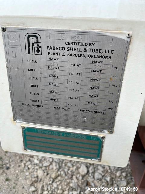 Used Fabsco Shell and Tube Heat Exchanger, 299 Square Foot. Carbon steel tubes rated 405 psi at 32 to 330 degrees F. 13' Tube length. Carbon steel head. Carbon steel shell rated 405 psi at 5 to 300 d...