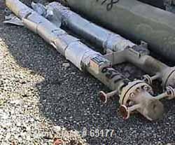 USED:Huffman heat exchanger, carbon steel, 26 sq ft, type/size BFU6/144. (12) 5/8" diameter x 12' long tubes providing 26 sq ft. 200 psig@ 300 deg F shell and tube side. Min -20 deg F @ 200 psig shel...