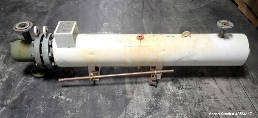 Used Ketema Shell and Tube Heat Exchanger, 18 Square Feet, Model 6-B-47, U Tube Design. Carbon steel tubes, tube sheet, bonnet and shell, (12) .75" diameter tubes rated 150 psi at 375 degrees F. Shel...
