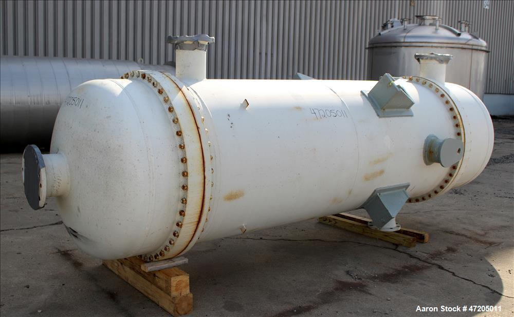 Unused- Perry Products Single Pass Shell & Tube Heat Exchanger, 4,143 Square Feet, Model FTS-48-4143, Vertical. Carbon steel shell rated 183 psi/Full Vacuum at -20 to 300 degrees F. (2110) 3/4" Diame...