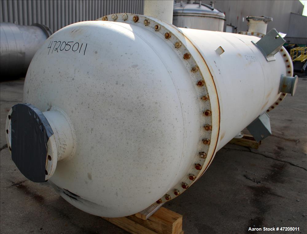 Unused- Perry Products Single Pass Shell & Tube Heat Exchanger, 4,143 Square Feet, Model FTS-48-4143, Vertical. Carbon steel shell rated 183 psi/Full Vacuum at -20 to 300 degrees F. (2110) 3/4" Diame...