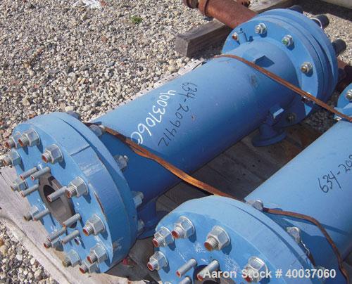 Used SGL Carbon Group Cylindrical Block Graphite Heat Exchanger. Approximately 25 square feet, vertical, model CK2. Service and process sides each rated 100 psi at 356 deg F. Openings: shell (2) 2", ...