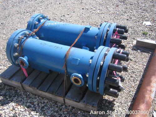 Used SGL Carbon Group Cylindrical Block Graphite Heat Exchanger. Approximately 25 square feet, vertical, model CK2. Service and process sides each rated 100 psi at 356 deg F. Openings: shell (2) 2", ...