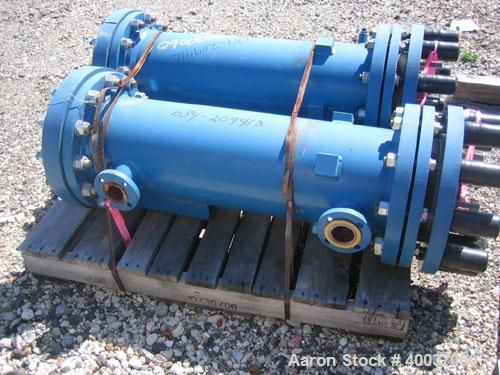 Used SGL Carbon Group Cylindrical Block Graphite Heat Exchanger. Approximately 25 square feet, vertical, model CK2. Service and process sides each rated 100 psi at 356 deg F. Openings: shell (2) 2", ...