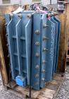 Used Carbone Graphilor Polyblock Heat Exchanger, Model K300/150-16. Process side 291 square feet, service side 147 square feet, process and service sides rated 100/100 psi at 32 to 360 deg F.
