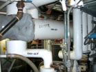 Used Doyle and Roth U Tube Heat Exchanger, approximately 25 square feet, horizontal. Carbon steel shell rated 100 psi at 350 deg F. (32) 3/4