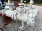 Used Fabsco Shell and Tube Heat Exchanger, 299 Square Foot. Carbon steel tubes rated 405 psi at 32 to 330 degrees F. 13' Tube length. Carbon steel head. Carbon steel shell rated 405 psi at 5 to 300 d...