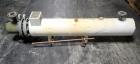 Used Ketema Shell and Tube Heat Exchanger, 18 Square Feet, Model 6-B-47, U Tube Design. Carbon steel tubes, tube sheet, bonnet and shell, (12) .75