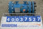 Used SGL Carbon Group Cylidrical Block Graphite Heat Exchanger. Approximately 25 square feet, vertical. Model CK2. Service and process sides each rated 100 psi at 356 deg F. Openings: shell (2) 2