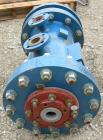 Used SGL Carbon Group Cylidrical Block Graphite Heat Exchanger. Approximately 25 square feet, vertical. Model CK2. Service and process sides each rated 100 psi at 356 deg F. Openings: shell (2) 2