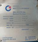 Used SGL Carbon Group Cylidrical Block Graphite Heat Exchanger. Approximately 25 square feet, vertical. Model CK2. Service and process sides each rated 100 psi at 356 deg F. Openings: shell (2) 2