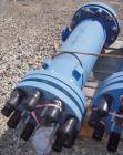 Used SGL Carbon Group Cylidrical Block Graphite Heat Exchanger. Approximately 25 square feet, vertical, model CK2. Service and process sides each rated 100 psi at 356 deg F. Openings: shell (2) 2
