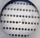 Used SGL Carbon Group Cylidrical Block Graphite Heat Exchanger. Approximately 25 square feet, vertical, model CK2. Service and process sides each rated 100 psi at 356 deg F. Openings: shell (2) 2